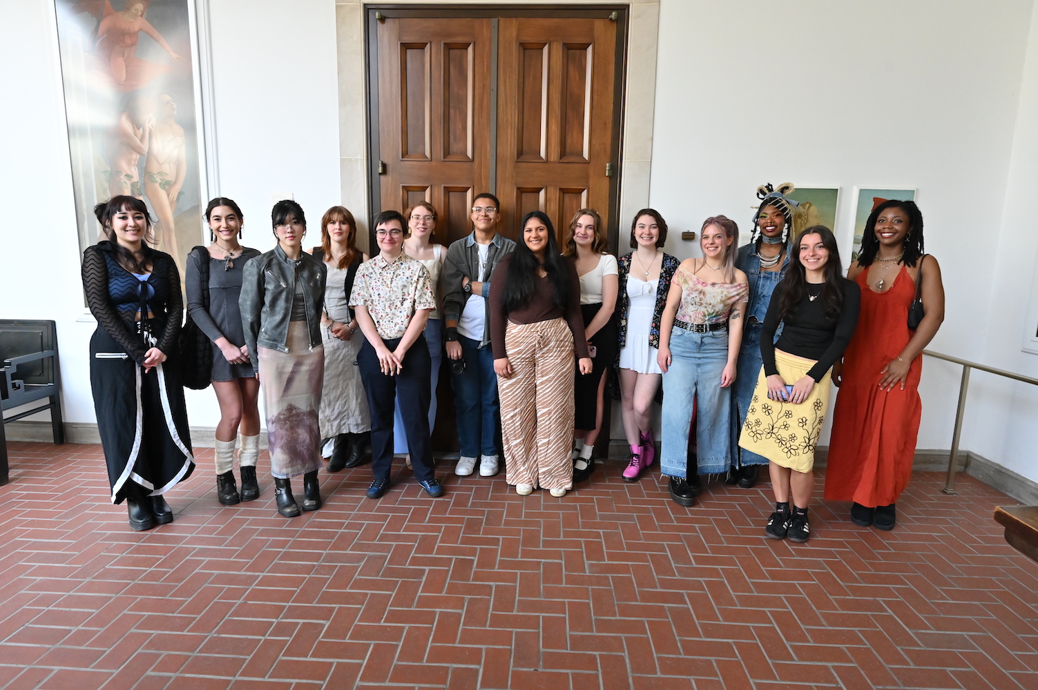 14 Studio Arts Seniors pose for a group photo