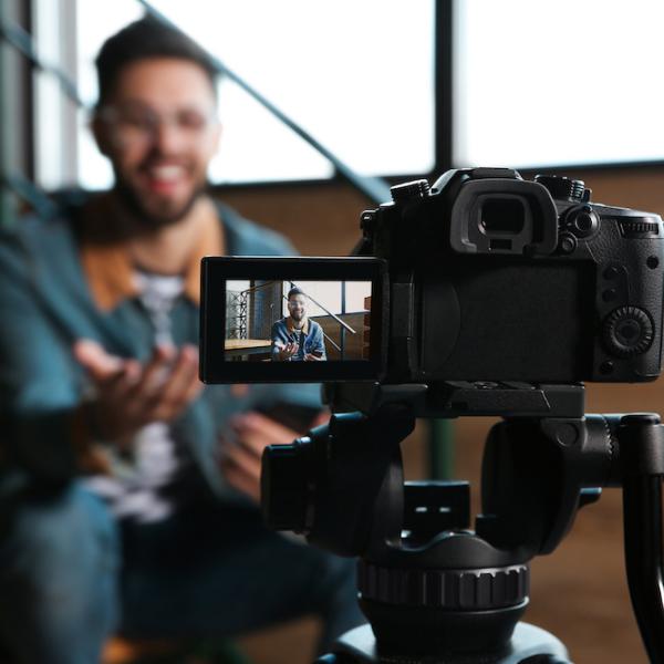 Individual films themselves in front of a camera